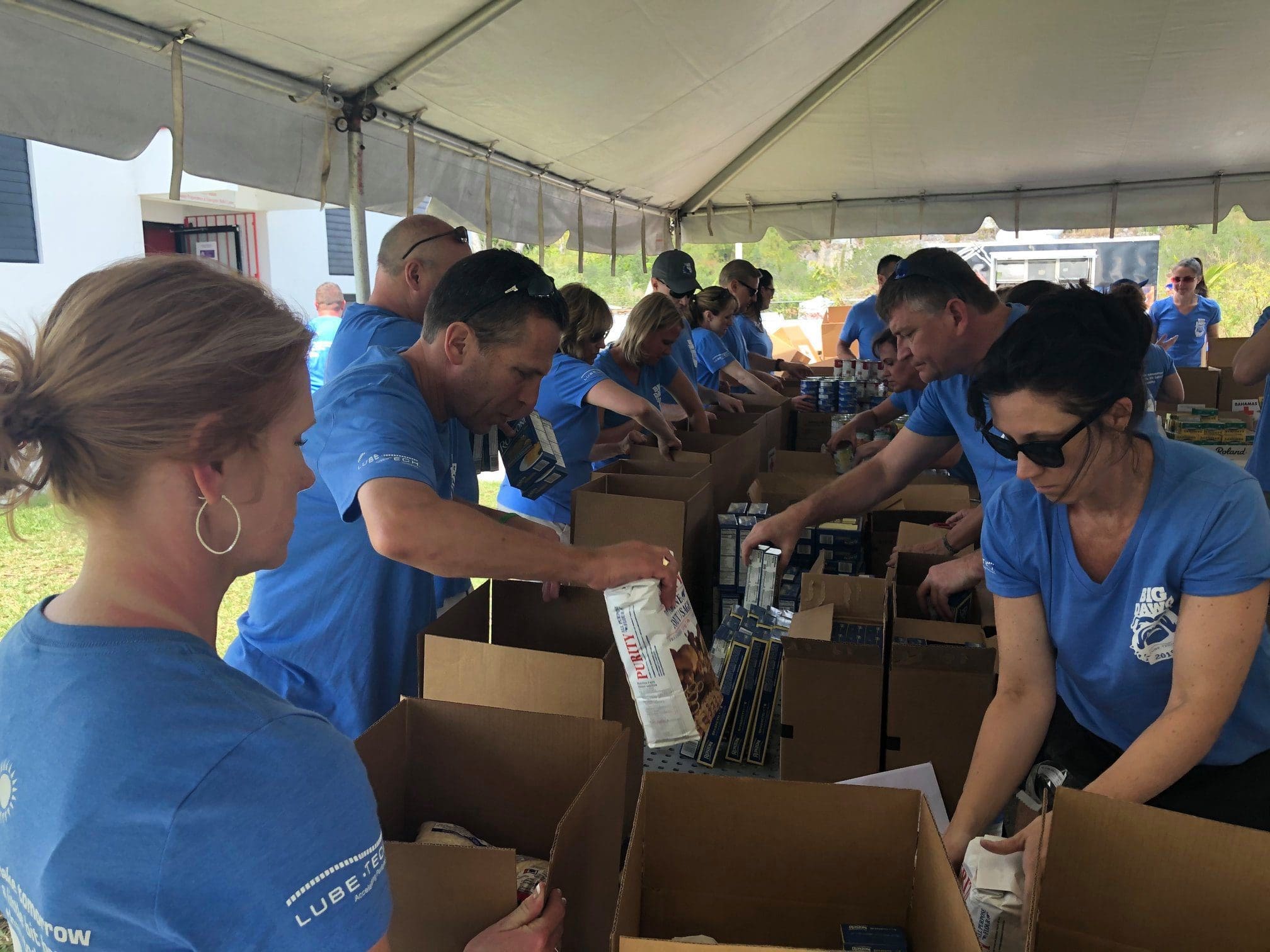 volunteers packing donation boxes