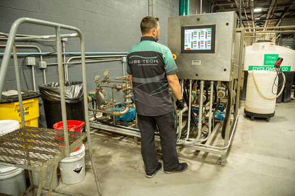 Lube-Tech technician at water-based fluids blending station